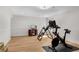 Spacious exercise room featuring wood flooring and home gym equipment at 2750 Interlaken Dr, Marietta, GA 30062