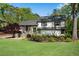 Charming two-story home with a manicured lawn and stone accents at 2750 Interlaken Dr, Marietta, GA 30062
