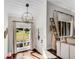 Bright foyer featuring hardwood floors, large windows, and an elegant lighting fixture at 2750 Interlaken Dr, Marietta, GA 30062
