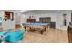 Large recreation room offering a ping pong table, hardwood floors, and a cozy seating area at 2750 Interlaken Dr, Marietta, GA 30062