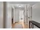 Light-filled hallway with hardwood floors, leads to bedrooms and living areas at 2750 Interlaken Dr, Marietta, GA 30062