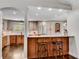 Well-lit kitchen features stainless steel appliances, wooden cabinets, and marble countertops at 2750 Interlaken Dr, Marietta, GA 30062