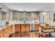 Spacious kitchen features stainless steel appliances, wood floors, and marble countertops at 2750 Interlaken Dr, Marietta, GA 30062