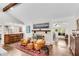 Inviting living room features a cozy fireplace, hardwood floors, and lots of natural light at 2750 Interlaken Dr, Marietta, GA 30062