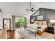 Main bedroom featuring vaulted ceiling, a seating area, and access to a private balcony at 2750 Interlaken Dr, Marietta, GA 30062
