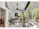 Sunroom with tile floors and views of the backyard at 2750 Interlaken Dr, Marietta, GA 30062