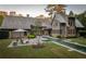 Expansive backyard featuring a pool, lush lawn, and patio, creating an ideal outdoor living space at 2979 Ridgewood Nw Rd, Atlanta, GA 30327