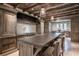 Well-equipped kitchen with an island with seating, custom cabinets, and high-end appliances for gourmet cooking at 2979 Ridgewood Nw Rd, Atlanta, GA 30327