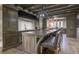 Spacious kitchen features custom cabinets, oversized island with seating, and high-end appliances, perfect for entertaining at 2979 Ridgewood Nw Rd, Atlanta, GA 30327