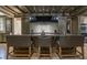 Modern kitchen with custom cabinets, oversized island with seating, and a clean design for a sophisticated look at 2979 Ridgewood Nw Rd, Atlanta, GA 30327