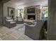 Cozy living room featuring a stone fireplace, comfortable seating, and natural light for a relaxing ambiance at 2979 Ridgewood Nw Rd, Atlanta, GA 30327