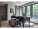 Bright office space features a large window, wooden desk, and stylish zebra print bench at 2979 Ridgewood Nw Rd, Atlanta, GA 30327