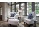 Inviting sitting room with comfortable armchairs, natural light, and elegant decor, creating a cozy ambiance at 2979 Ridgewood Nw Rd, Atlanta, GA 30327