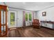 Comfortable living room with hardwood floors, natural light, and neutral color palette at 363 Arnold Mill Rd, Woodstock, GA 30188