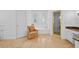 Bathroom featuring a tub, shower, and single chair set against a backdrop of tiled flooring at 4470 Crestwicke Pointe, Atlanta, GA 30319
