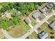 An aerial view of a two-story home with a driveway and green lawn in a residential neighborhood at 74 Macland Mill Ln, Dallas, GA 30157