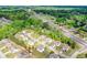 Aerial view of a neighborhood with homes, trees, and a road nearby at 74 Macland Mill Ln, Dallas, GA 30157