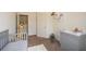 A Bedroom with animal plushies and neutral wall paint at 74 Macland Mill Ln, Dallas, GA 30157