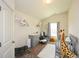 A Bedroom with animal plushies and neutral wall paint at 74 Macland Mill Ln, Dallas, GA 30157