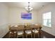 Dining room with dark wood floors, chandelier, and a formal dining table with seating for six at 74 Macland Mill Ln, Dallas, GA 30157