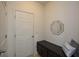 Inviting entryway features a bench with storage and a decorative mirror at 74 Macland Mill Ln, Dallas, GA 30157