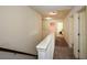 Upstairs hallway with carpet and white doors at 74 Macland Mill Ln, Dallas, GA 30157