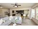 Open-concept living room with view of kitchen and staircase at 74 Macland Mill Ln, Dallas, GA 30157