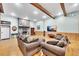 Inviting living room with stone fireplace, wood beams, and plush seating at 800 Knox Ln, Canton, GA 30114