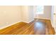 Neutral bedroom with hardwood floors and great natural light at 145 Holly Nw Rd, Atlanta, GA 30314