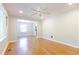 Bright living room features hardwood floors, lots of light, and neutral paint at 145 Holly Nw Rd, Atlanta, GA 30314