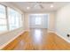 Open living room with hardwood floors, lots of light, and neutral paint at 145 Holly Nw Rd, Atlanta, GA 30314