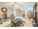 Spacious living room area with a fireplace and seating at 2130 Boulder Gate Dr, Ellenwood, GA 30294