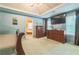 This main bedroom features a carpet floor, blue walls, and furniture at 2130 Boulder Gate Dr, Ellenwood, GA 30294