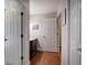Hallway view leading to bathroom, showcasing natural light and neutral paint at 505 Bainbridge Dr, Atlanta, GA 30327