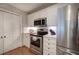 Efficient kitchen showcases white cabinets, stainless steel appliances, and marble countertops at 505 Bainbridge Dr, Atlanta, GA 30327