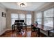 Well-lit home office featuring hardwood floors and a large window bringing in lots of natural light at 505 Bainbridge Dr, Atlanta, GA 30327
