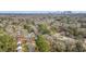 Aerial view of a property surrounded by mature trees, located in a quiet neighborhood near the city at 1111 Edgefield Sw Dr, Atlanta, GA 30310