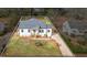 Aerial view showcases the home's well-maintained lawn, landscaping, and charming curb appeal at 1111 Edgefield Sw Dr, Atlanta, GA 30310