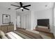 Primary bedroom offers a ceiling fan, stylish furnishings and ample storage space at 1111 Edgefield Sw Dr, Atlanta, GA 30310