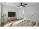Spacious bedroom boasts wood floors, ceiling fan, and a modern aesthetic at 1111 Edgefield Sw Dr, Atlanta, GA 30310