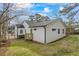 Charming exterior view showcases a newly renovated home with white siding and a cozy porch at 1111 Edgefield Sw Dr, Atlanta, GA 30310