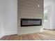 Modern fireplace featuring contemporary finishes and sleek design elements at 1111 Edgefield Sw Dr, Atlanta, GA 30310