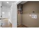 Efficient laundry room features washer/dryer hookups and a tankless water heater at 1111 Edgefield Sw Dr, Atlanta, GA 30310