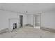 Living room features beadboard walls, a traditional fireplace, and doorways to other rooms at 119 E Johnson St, Temple, GA 30179