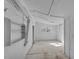 Bright white room features open shelves, plank walls, and a sunny window at 119 E Johnson St, Temple, GA 30179