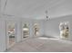 Bright, unfinished room with large windows offering abundant natural light and exterior views at 119 E Johnson St, Temple, GA 30179
