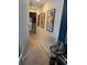 Hallway featuring modern wall art and design, with views to other rooms at 1280 W Peachtree Nw St # 2201, Atlanta, GA 30309