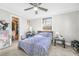 Bedroom with neutral carpet and decor, ceiling fan, and walk in closet at 240 Lamon Se Ave, Atlanta, GA 30316