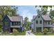 Exterior view of two modern, craftsman-style homes with manicured lawns and shared driveway at 240 Lamon Se Ave, Atlanta, GA 30316
