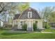 Charming two-story home with a shingle roof and a well-manicured lawn at 240 Lamon Se Ave, Atlanta, GA 30316